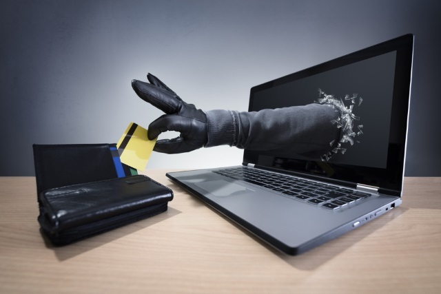 MUO-turvallisuus-phonescams käden-kukkaro